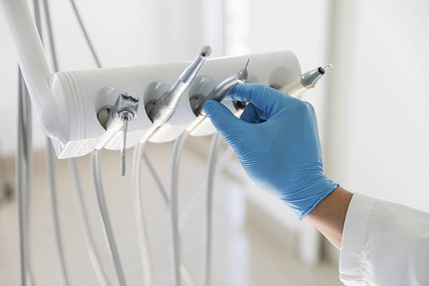Professional Tooth Extraction technician working in Springs, NY